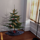 Illustration for article titled 3-Foot-Tall Christmas Tree Really Completes Incredibly Depressing Apartment